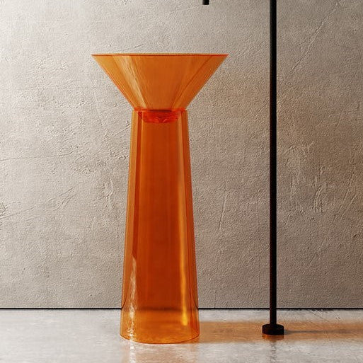 Orange glass vase on a neutral background