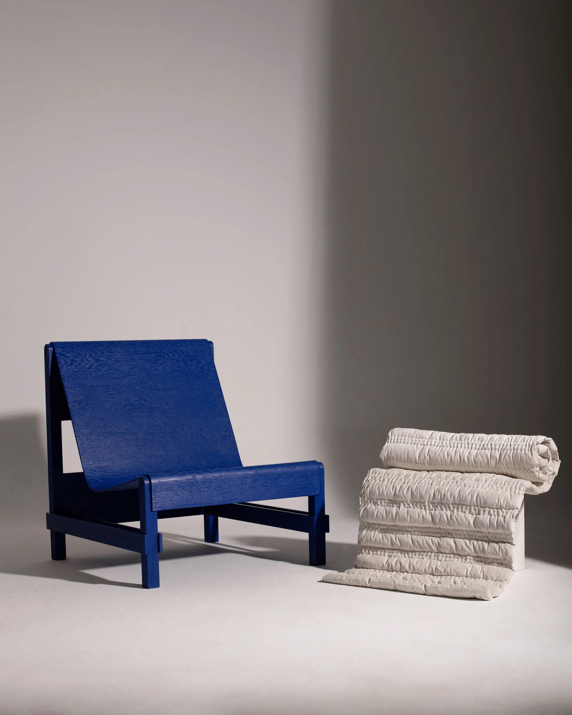 Modern Lounge Chair – Blue Frame with Quilted Cushion