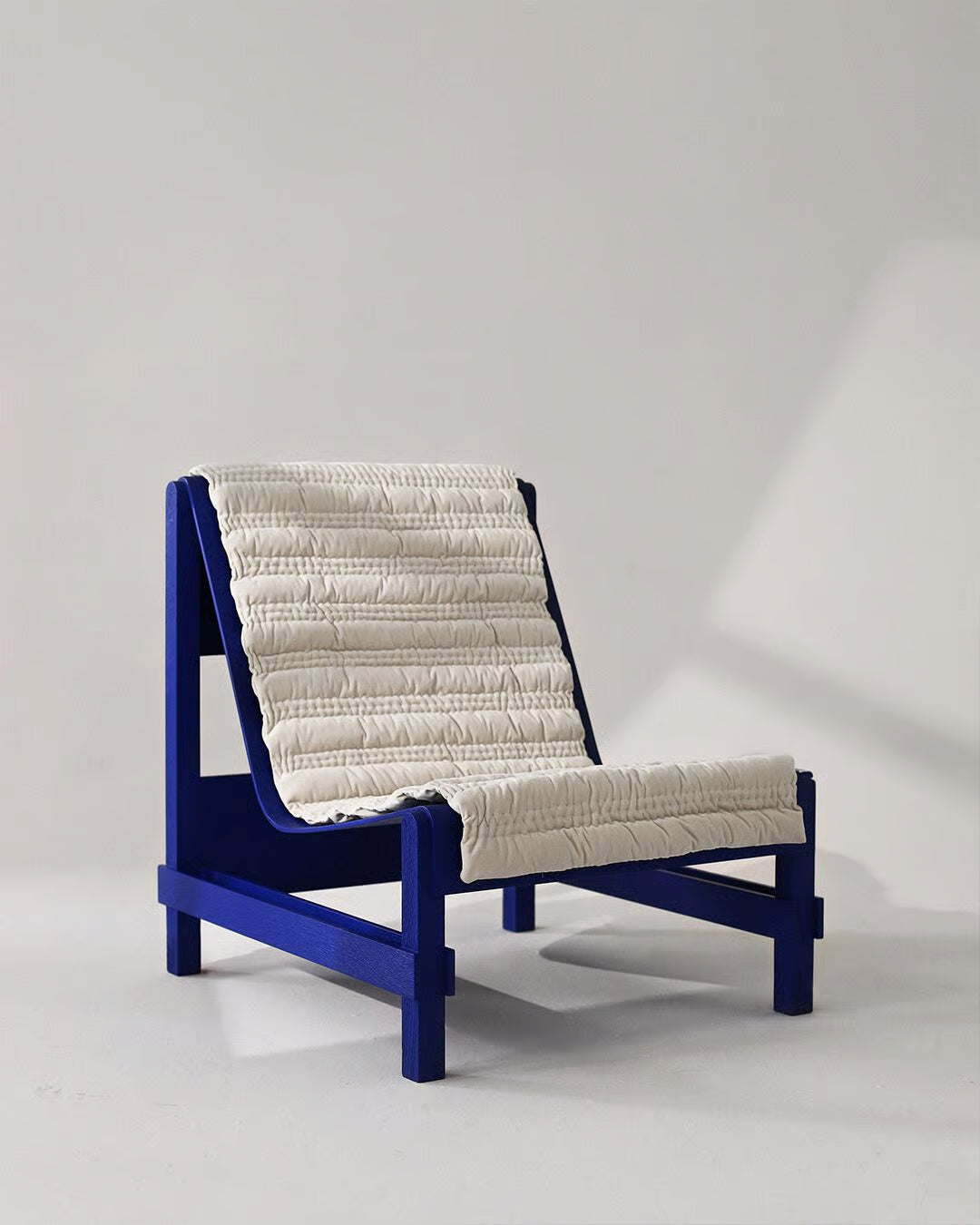 Modern Lounge Chair – Blue Frame with Quilted Cushion